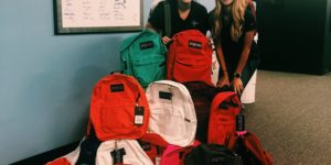 WestCMR and Caring Partners International Team Up to Send Backpacks to Students in Need