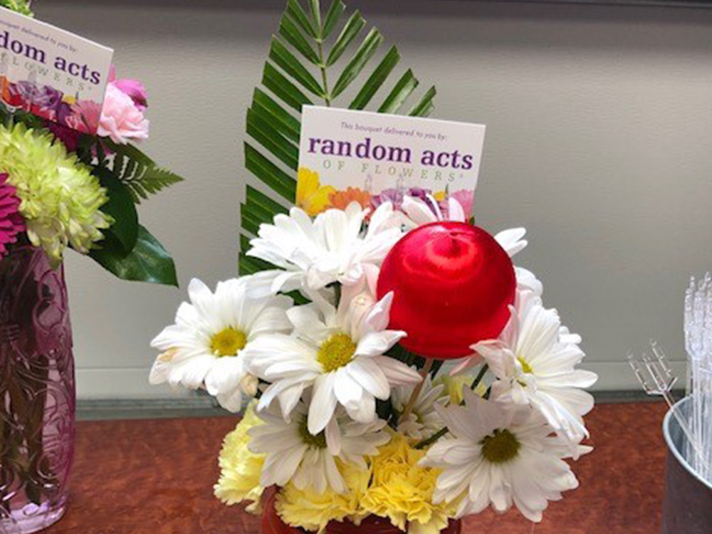 WestCMR Volunteer Brings Joy with Random Acts of Flowers ...